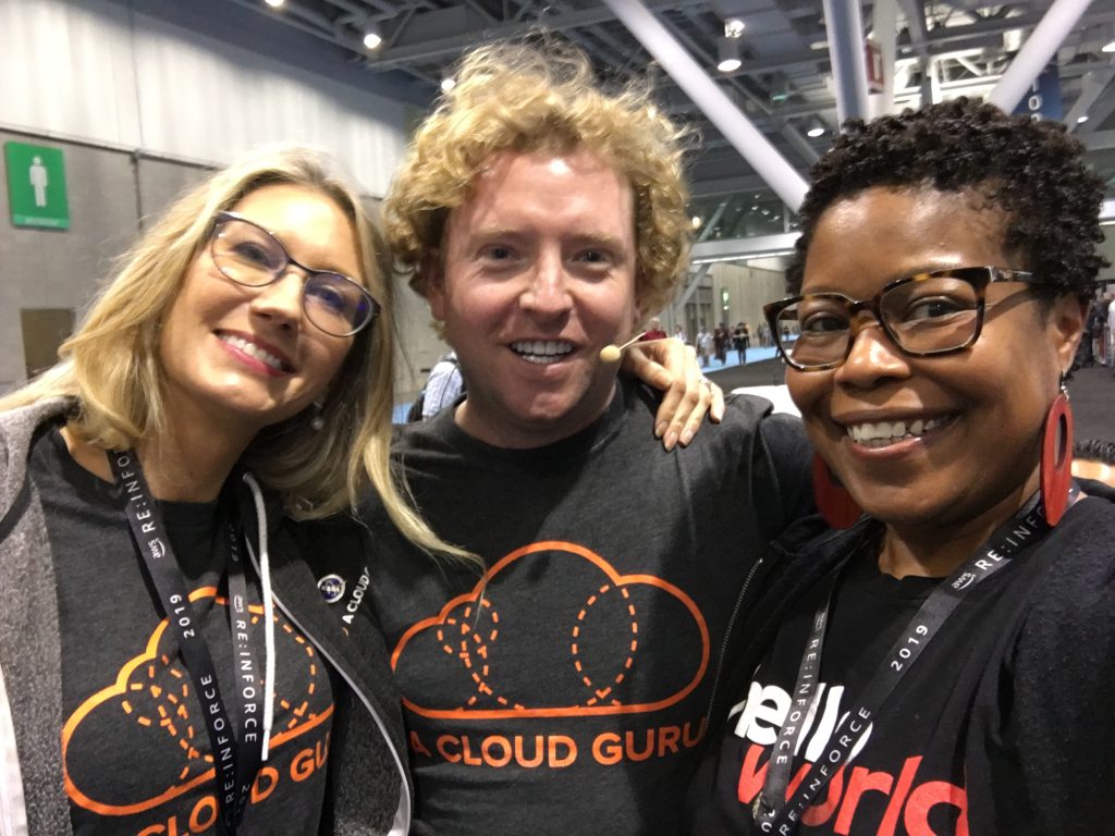 3 people smiling at camera